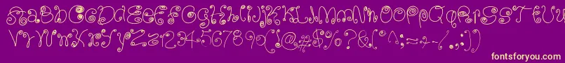 Czcionka SquigglyLittleWiggly – żółte czcionki na fioletowym tle