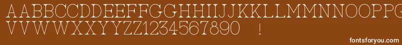 Шрифт AcBigserifOne – белые шрифты на коричневом фоне