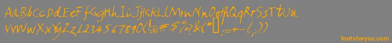 フォントAmano – オレンジの文字は灰色の背景にあります。