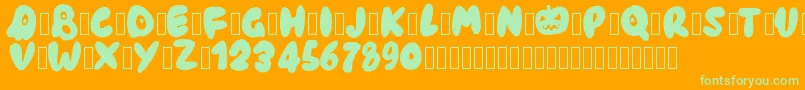 Pwhaunted Font – Green Fonts on Orange Background