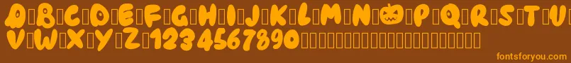 Pwhaunted Font – Orange Fonts on Brown Background