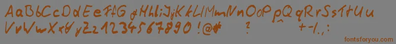 ThommyHandwrite-fontti – ruskeat fontit harmaalla taustalla