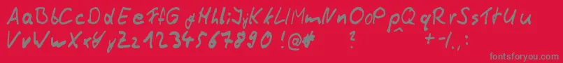 ThommyHandwrite-fontti – harmaat kirjasimet punaisella taustalla