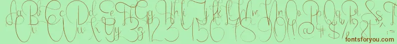 EmanuelaLight-fontti – ruskeat fontit vihreällä taustalla