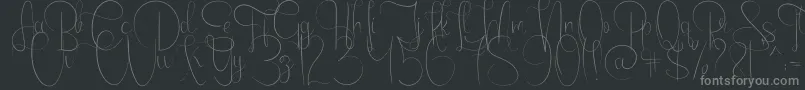 EmanuelaLight-fontti – harmaat kirjasimet mustalla taustalla
