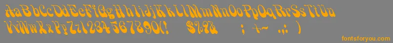 Grooovvelic-Schriftart – Orangefarbene Schriften auf grauem Hintergrund