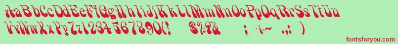 Grooovvelic Font – Red Fonts on Green Background