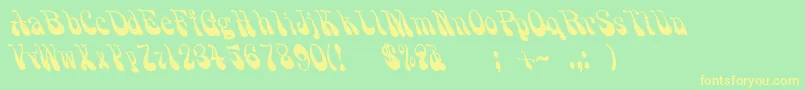 Grooovvelic Font – Yellow Fonts on Green Background