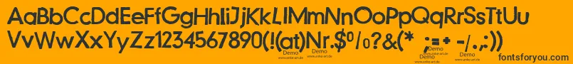 Czcionka JustanotherstampfontDemo – czarne czcionki na pomarańczowym tle