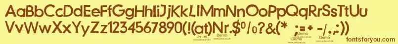 fuente JustanotherstampfontDemo – Fuentes Marrones Sobre Fondo Amarillo