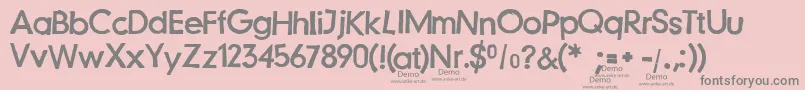 フォントJustanotherstampfontDemo – ピンクの背景に灰色の文字