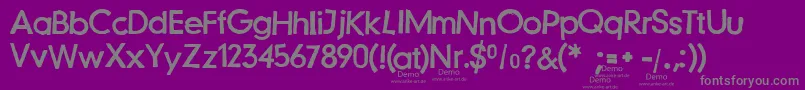 fuente JustanotherstampfontDemo – Fuentes Grises Sobre Fondo Morado