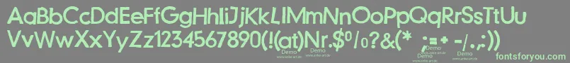 Fonte JustanotherstampfontDemo – fontes verdes em um fundo cinza