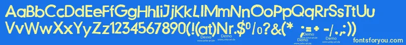 JustanotherstampfontDemo Font – Yellow Fonts on Blue Background