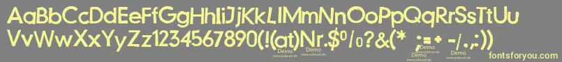 Czcionka JustanotherstampfontDemo – żółte czcionki na szarym tle