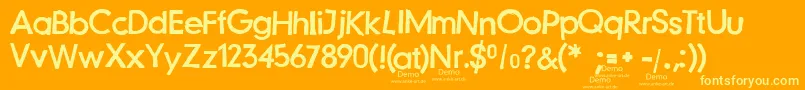 JustanotherstampfontDemo-Schriftart – Gelbe Schriften auf orangefarbenem Hintergrund