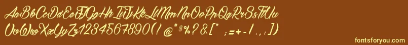 BostellaС† Font – Yellow Fonts on Brown Background