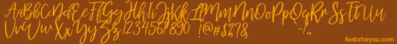 MellonyDryBrush Font – Orange Fonts on Brown Background