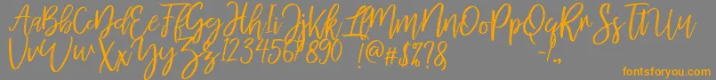 MellonyDryBrush Font – Orange Fonts on Gray Background