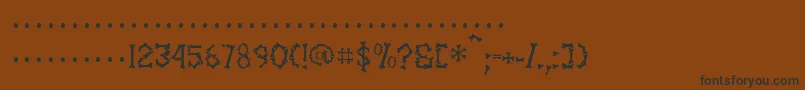 フォントSettervkBlack – 黒い文字が茶色の背景にあります