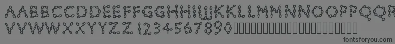 フォントPwchainsfonts – 黒い文字の灰色の背景