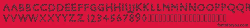 フォントPwchainsfonts – 赤い背景に黒い文字