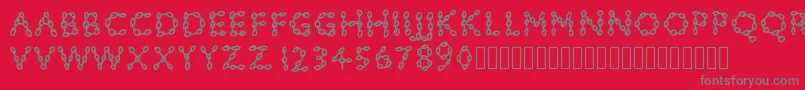 Pwchainsfonts-Schriftart – Graue Schriften auf rotem Hintergrund
