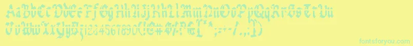 UberhГ¶lmeLazarCondensed Font – Green Fonts on Yellow Background