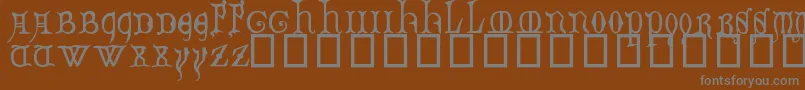 DecoratedMajuscules14thC. Font – Gray Fonts on Brown Background