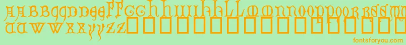 DecoratedMajuscules14thC. Font – Orange Fonts on Green Background