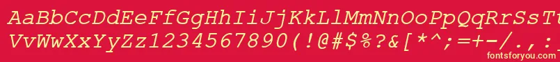 Czcionka ErKurierKoi8Italic – żółte czcionki na czerwonym tle