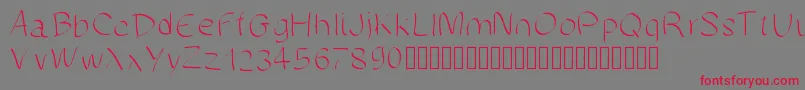 フォントManuscrite – 赤い文字の灰色の背景