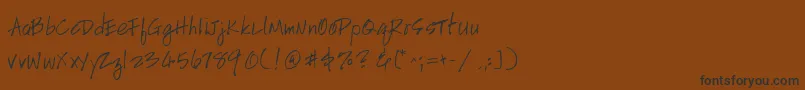 Police HandscriptleftyItalic – polices noires sur fond brun