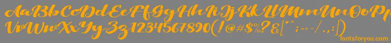 Шрифт ViksiScript – оранжевые шрифты на сером фоне