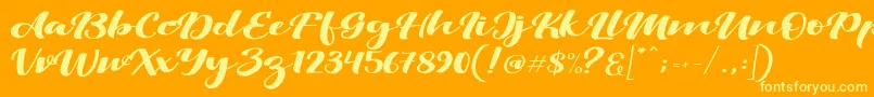 ViksiScript Font – Yellow Fonts on Orange Background