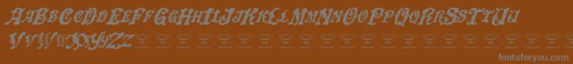 Fonte DinglehuckleberryItalic – fontes cinzas em um fundo marrom
