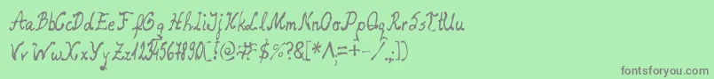 フォントRelaxed – 緑の背景に灰色の文字