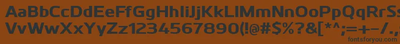 フォントKuroExtrabold – 黒い文字が茶色の背景にあります