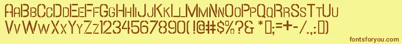 Hallandalestencilsc-fontti – ruskeat fontit keltaisella taustalla