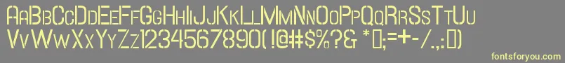 Hallandalestencilsc-fontti – keltaiset fontit harmaalla taustalla