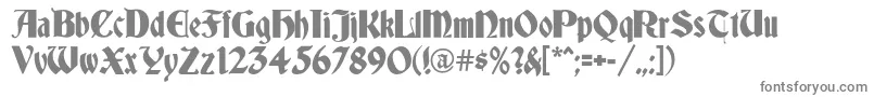Germania-fontti – harmaat kirjasimet valkoisella taustalla