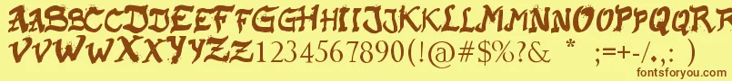 フォントRaslaniKaplash – 茶色の文字が黄色の背景にあります。