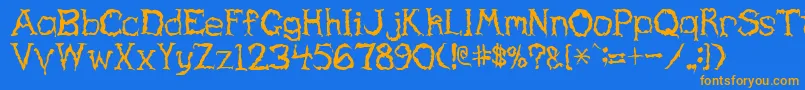 フォントHaunted – オレンジ色の文字が青い背景にあります。