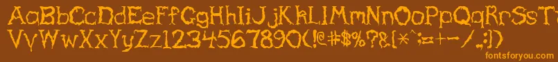 Haunted-Schriftart – Orangefarbene Schriften auf braunem Hintergrund