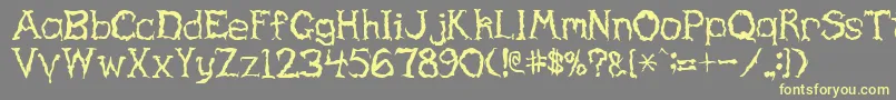 Haunted Font – Yellow Fonts on Gray Background