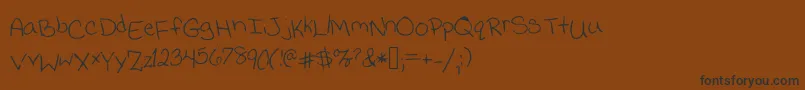 Jessicaprint Font – Black Fonts on Brown Background