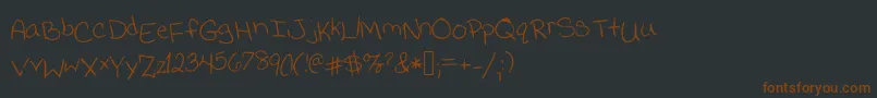 Jessicaprint-fontti – ruskeat fontit mustalla taustalla