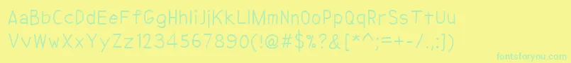 NipcenSPrintUnicode-fontti – vihreät fontit keltaisella taustalla