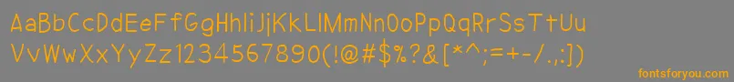 NipcenSPrintUnicode Font – Orange Fonts on Gray Background