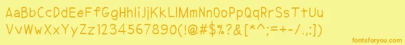NipcenSPrintUnicode Font – Orange Fonts on Yellow Background